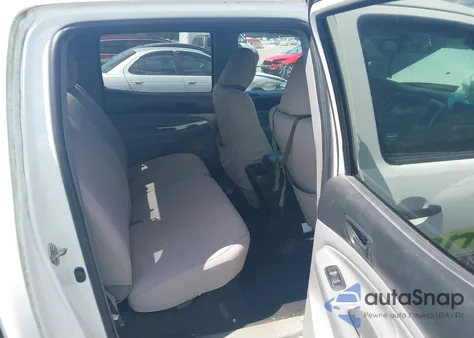 2014 Toyota Tacoma Base V6 z USA, uszkodzony, nr VIN 3TMLU4EN5EM149635